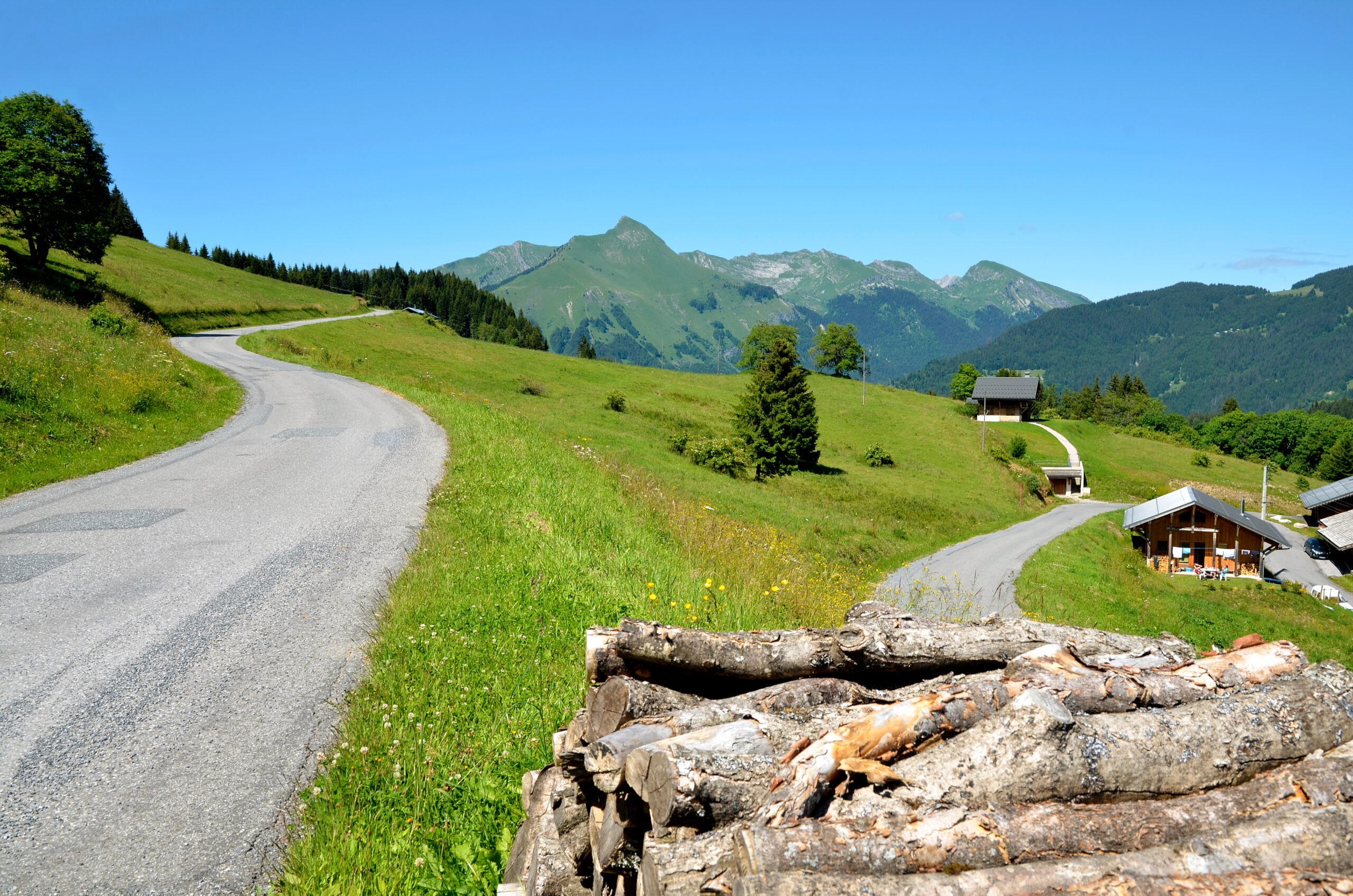 road in the alps mountains near morzine in france