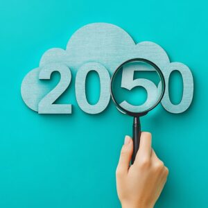 hand examines 2050 cloud future vision on teal